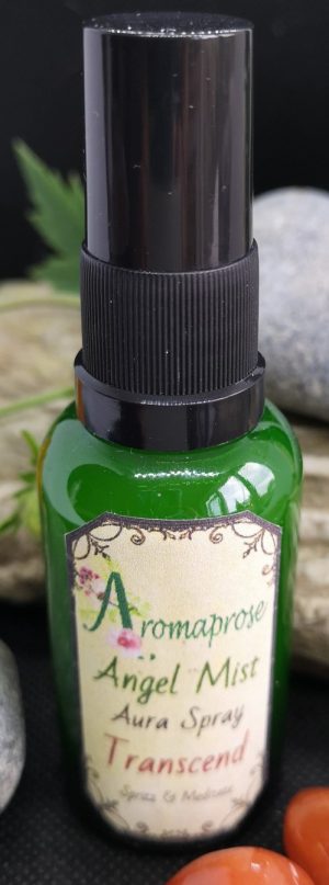 Pillow and Aura spray in a green bottle