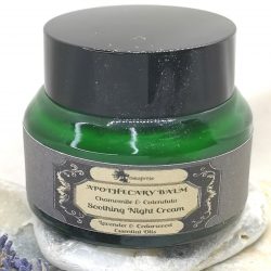 Soothing cream in green glass jar