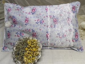 Pink and grey floral fabric herbal pillow with lavender and chamomile
