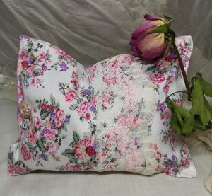 Herbal pillow with pink floral fabric