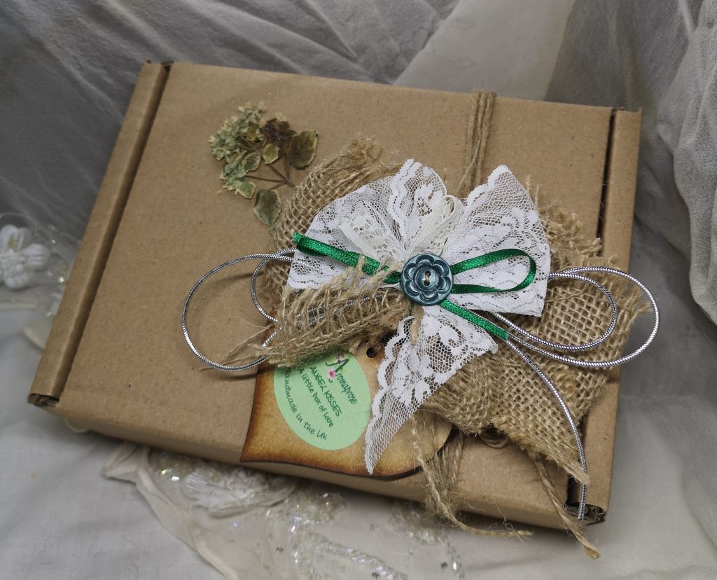An eco kraft box decorated with hessian box and lace