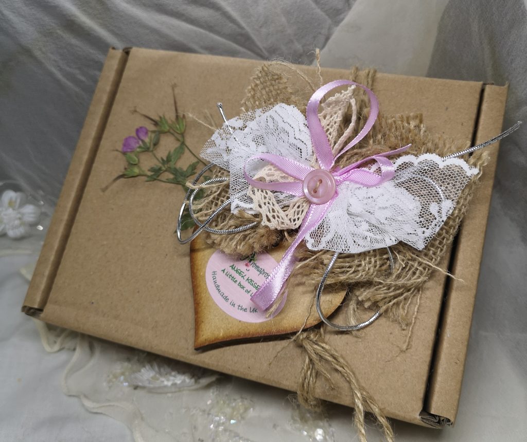 An eco kraft gift box colour themed pink