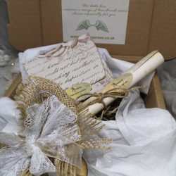 contents of white themed gift box