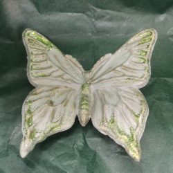 A green sparkly butterfly trinket dish