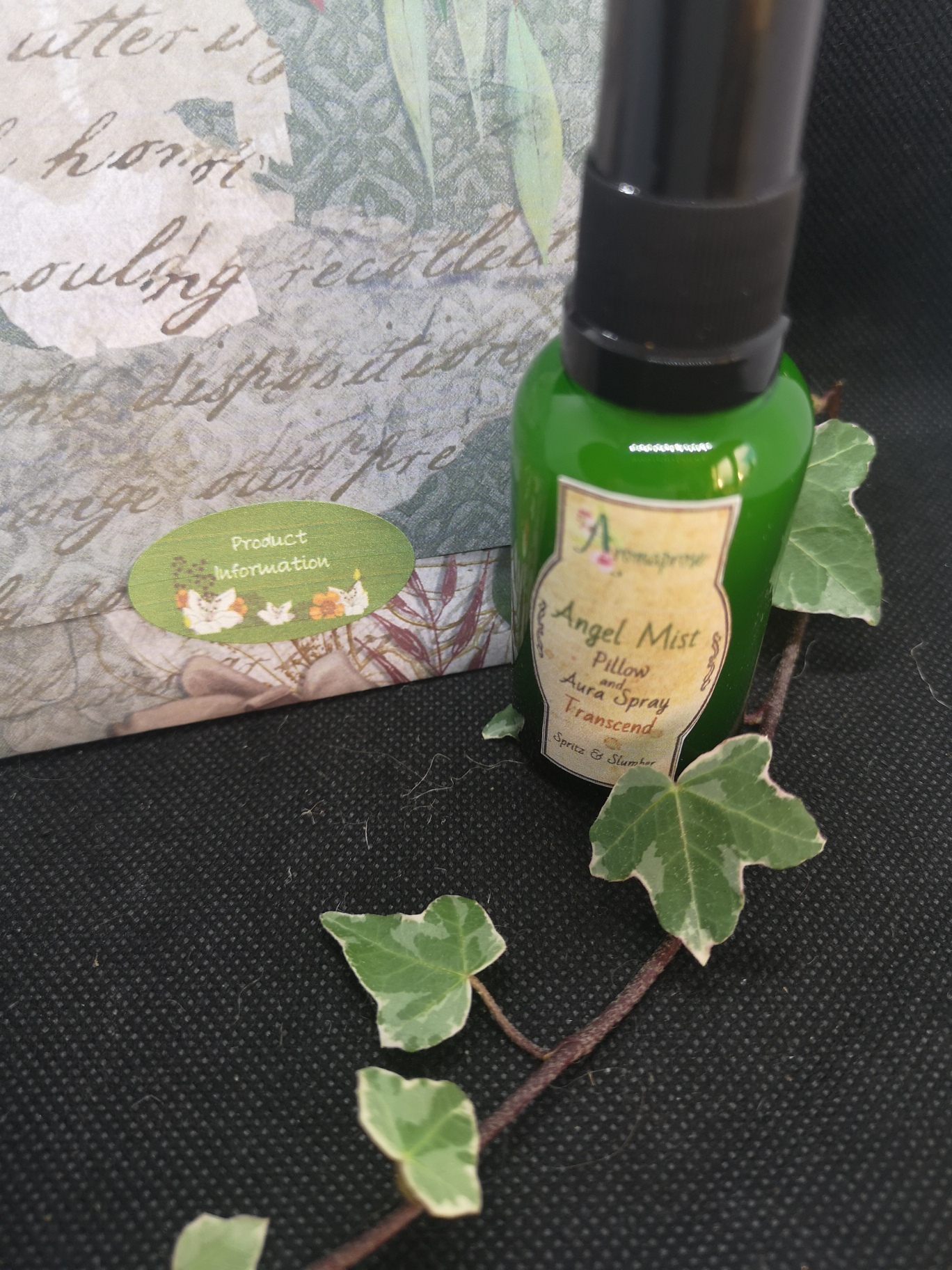 Pillow and Aura Spray with product booklet