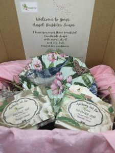 a gift set with handmade soaps and soap dish