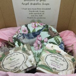 a gift set with handmade soaps and soap dish