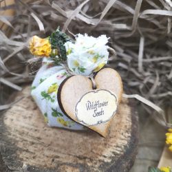 A hand tied pouch of wild flower seeds