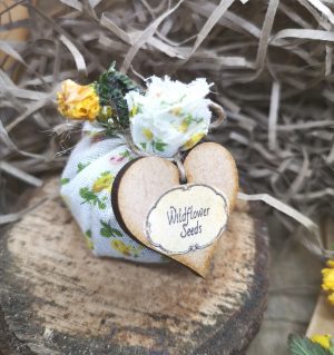 A hand tied pouch of wild flower seeds