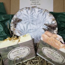 A gift box set with seashell dish and handmade soaps