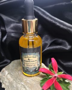 A golden facial oil in a dropper bottle
