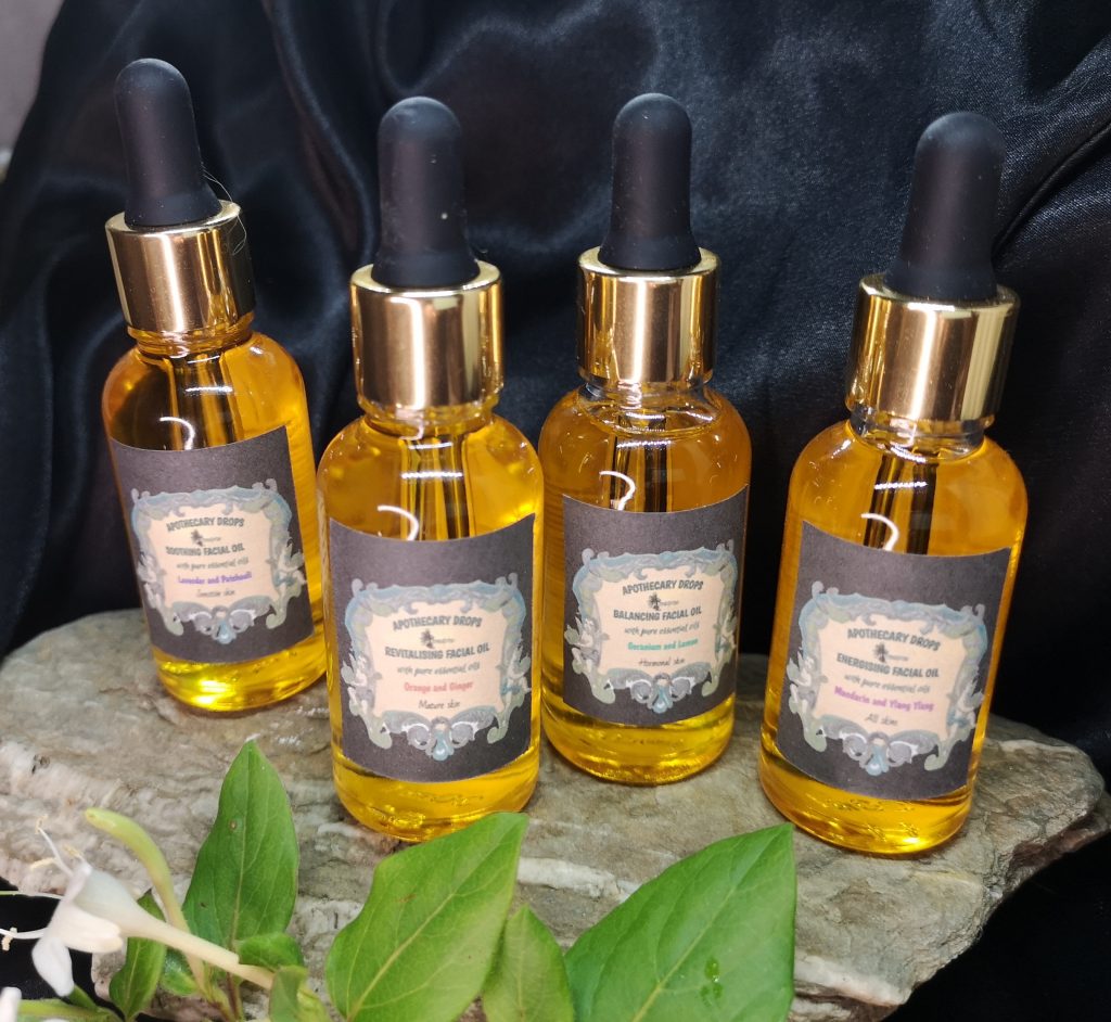 a set of 4 facial oils with droppers